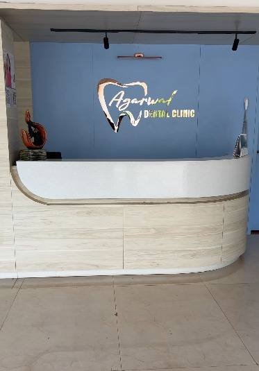 Specialist handling advanced dental equipment